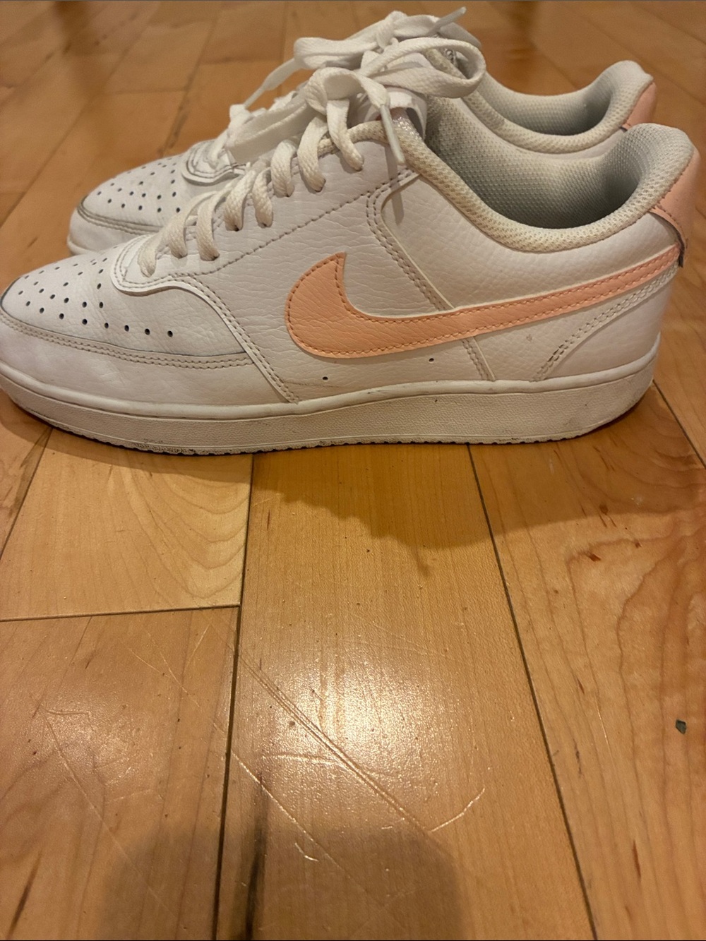 Nike Women’s White Sneakers with Pink Swoosh